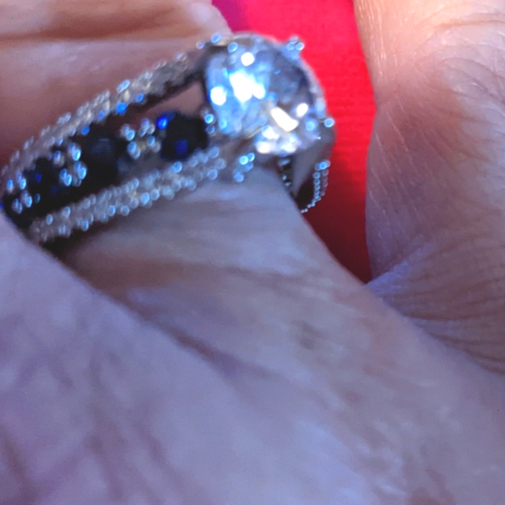 Sterling Silver Blue Sapphire Ring with Simulated diamond.  Size 7